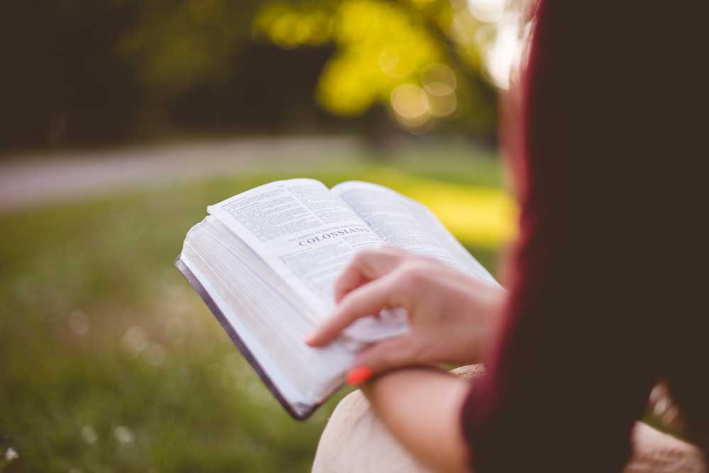 woman reading her Bible