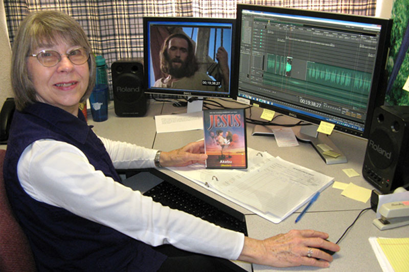 Woman working on the JESUS film voice synchronization