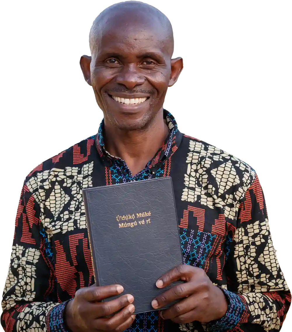 Man holding new Scripture