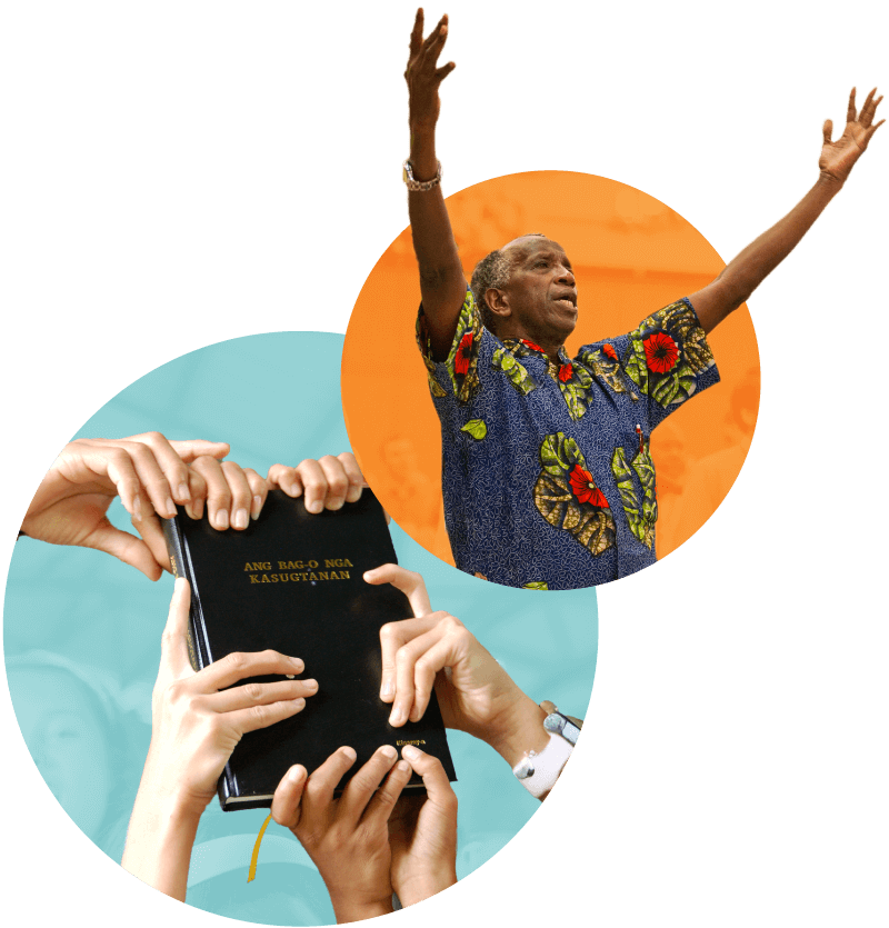 Man with raised arms, a new BIble being celebrated