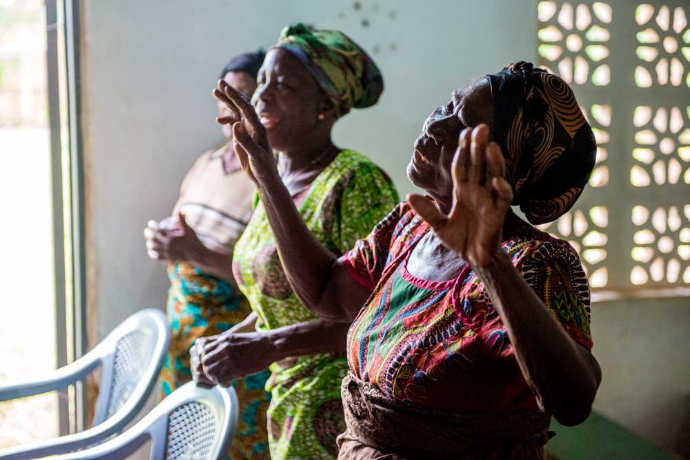 Women worshipping at church